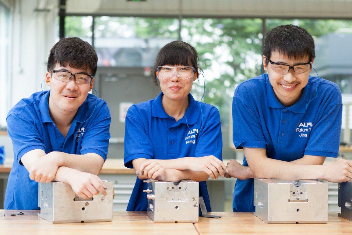 Three apprentices from China. 