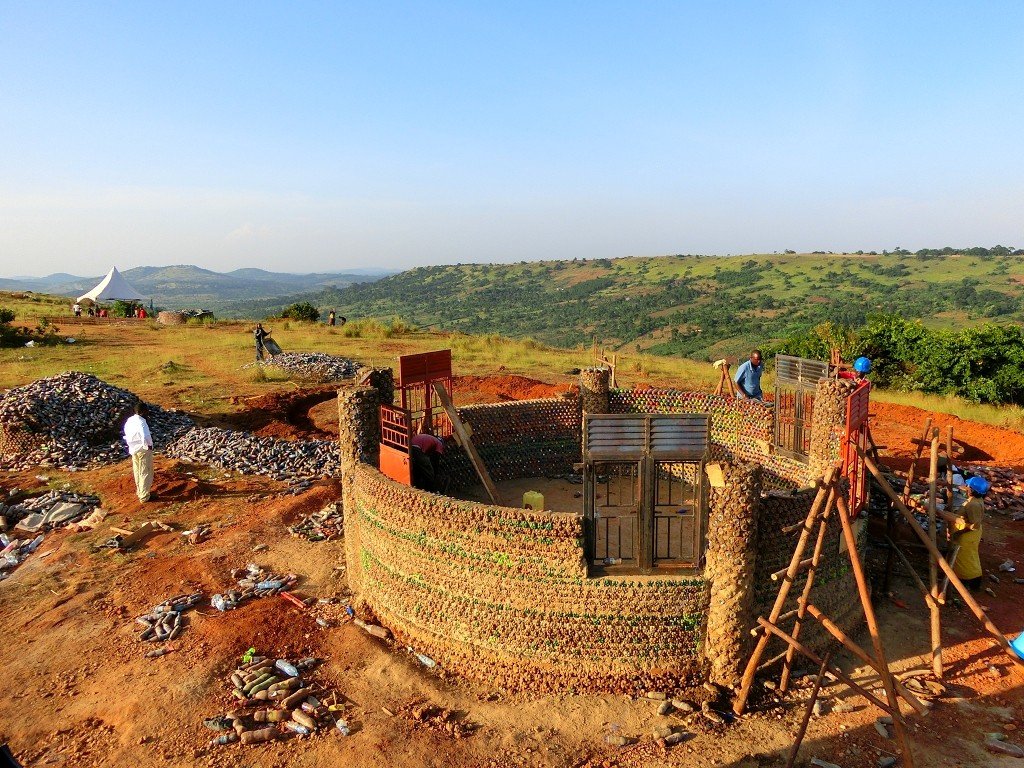 Bottle house during construction.