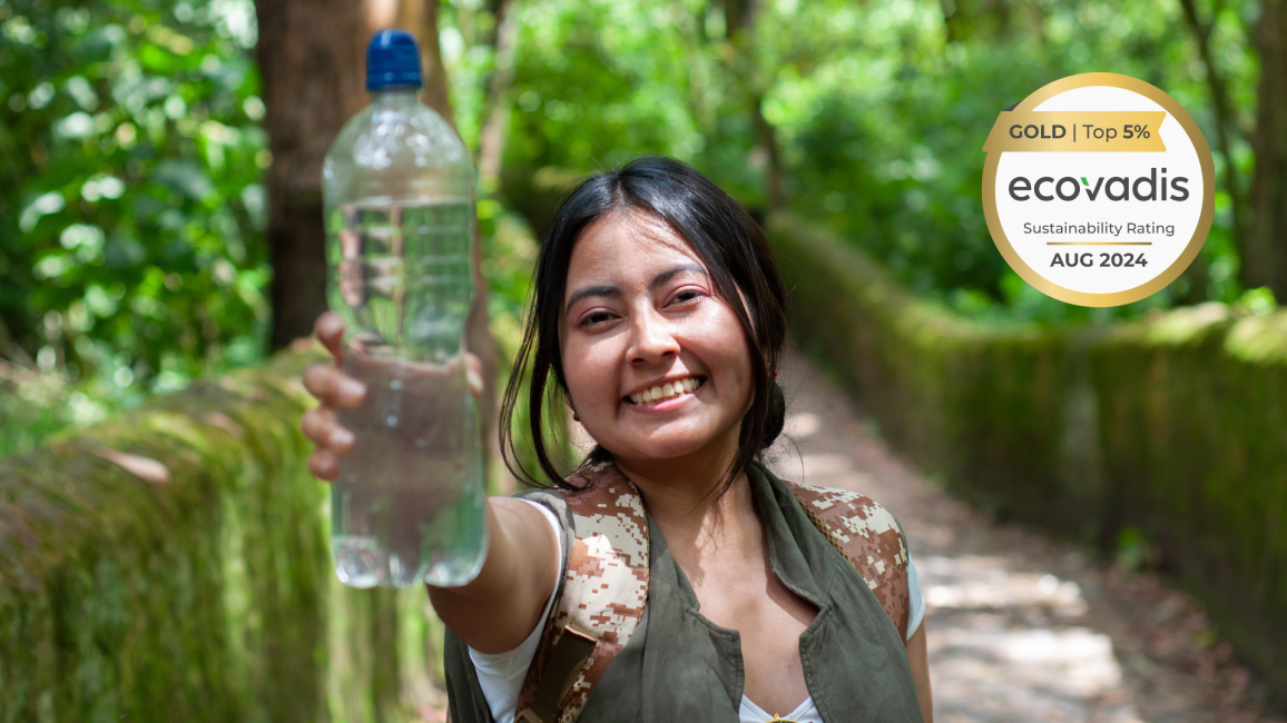 Woman shows a PET bottle