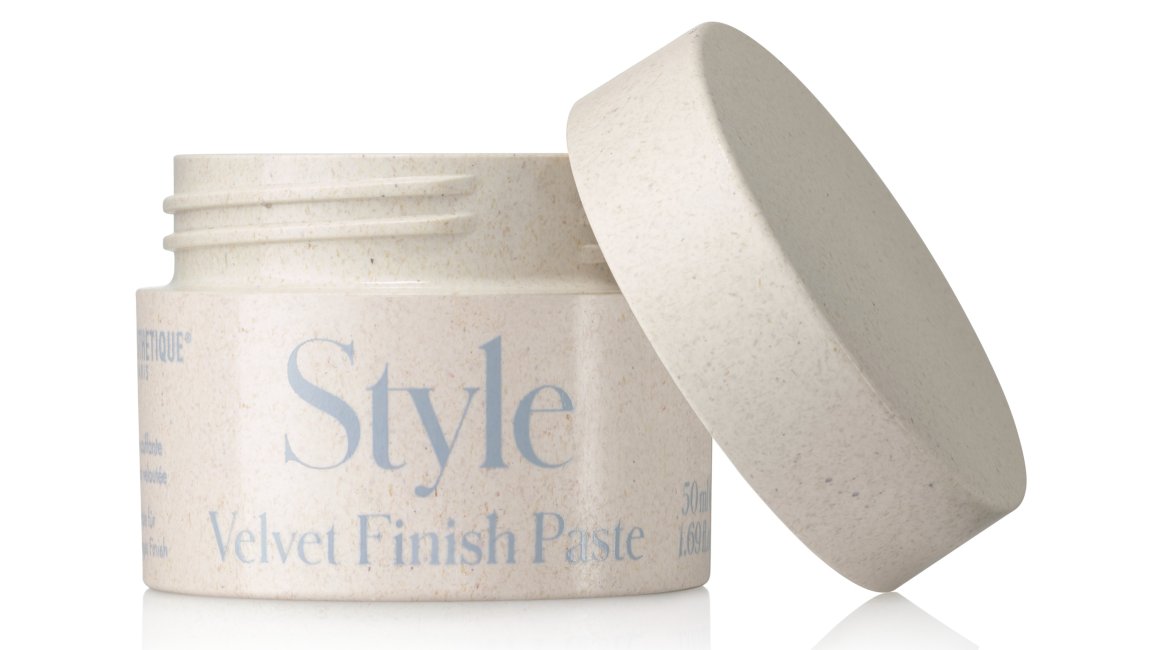 Nachhaltige Kunststoffdose mit Schraubdeckel und der Aufschrift "Style Velvet Finish Paste" in hellblauer Schrift.