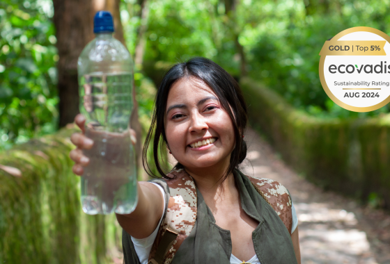 Woman shows a PET bottle