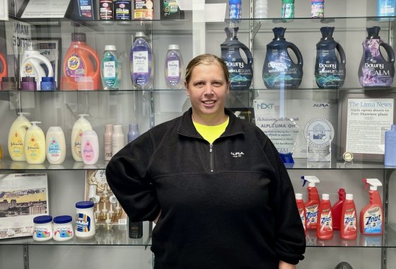 Jenny Logan in front of ALPLA packaging products.